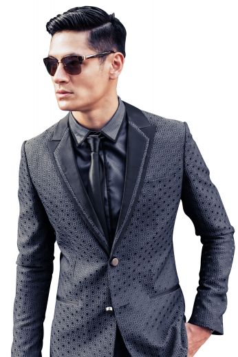 This single breasted mens bespoke tuxedo jacket in grey sports stylish circular patterns in black that creates a stunning contrast. It is made to order with premium quality Mohair wool, hand woven to display an intricately designed double layer collar alongside a classic lapel with hand sewn satin on the upper layer. Fabricated to display a classy slim cut fitting, this made to order tux jacket looks even better with 2 double piped lower pockets, 1 upper welt pocket, and 2 hand sewn front closure buttons.