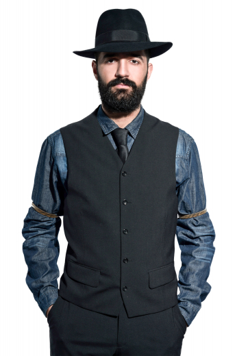 This black men's vest is tailor made in a wool blend, featuring a single breasted closure, v neck, and flapped lower pockets. 
