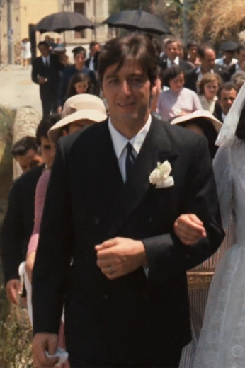 For a classic wedding tuxedo, look no further. This sophisticated hand-tailored men's double-breasted black tuxedo has stayed in style for over a decade and will never go out of style.