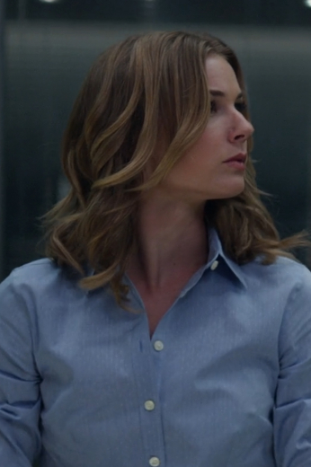 A light blue intricately detailed women’s shirt as seen in the Captain America 2 film. This bespoke women’s costume is a great buy for cosplay.
