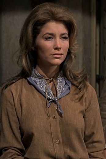 Women’s hand tailored cosplay El Dorado blouse custom made in the exact cut and design as seen in El Dorado. Add casual charm to your closet with this tailored movie replica blouse. A great celebrity clothing buy right from Hollywood.