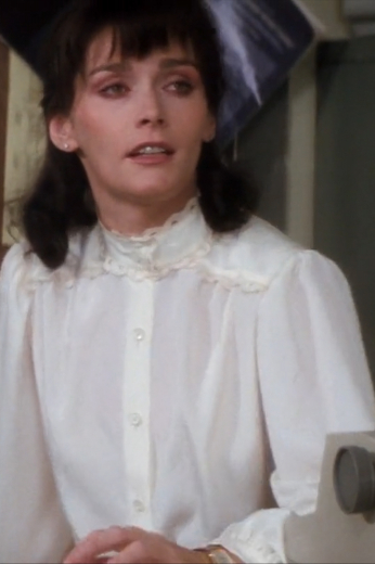 Style no.20433 - Buy this custom tailored women’s blouse worn by actress Margot Kidder as Lois Lane in the epic 1980 Superman II film. This white summer blouse is available to order online.