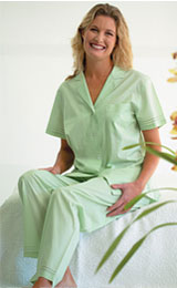 Stylish light green cotton pajamas flashing comfortable elastic waistband. Put to view matching handmade cotton shirts with front button closure, plain back and pocket on the front left.