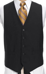 A men's elegantly single breasted sharply angled five button two pocket vest made beautifully out of virgin cashmere.